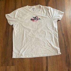 White Hollister Tee with butterfly design.